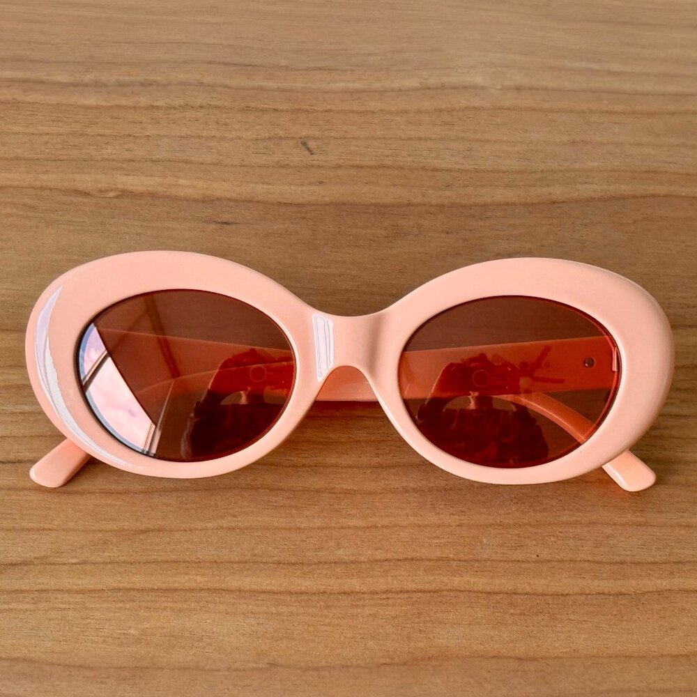 Crap Eyewear Pink Oval Frame Sunglasses with Red Lenses